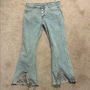 Frayed Hem Flare Jeans in Light Blue with bejeweled bottoms never worn